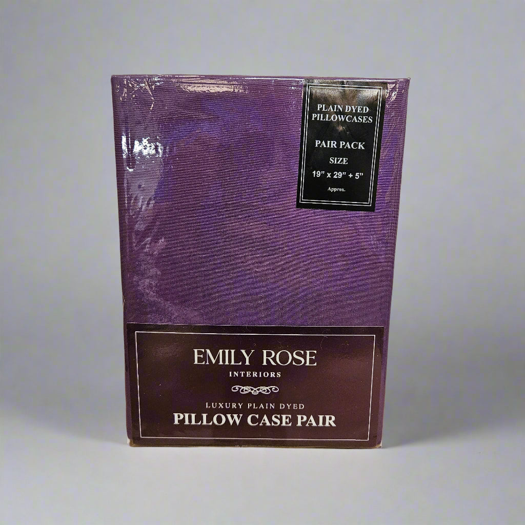 Purple packaging of Emily Rose Interiors pillow case pair on a textured surface.